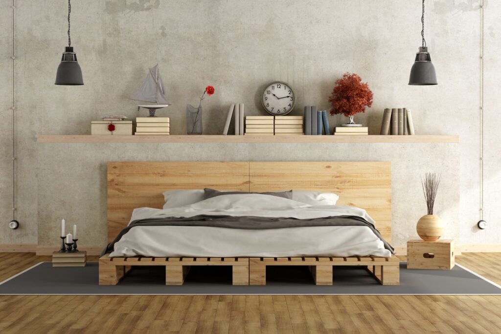 Lit en palette dans une chambre